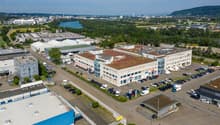Multi-building industrial estate with parking lot and road network
