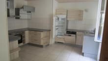 Wood cabinets, tile floor, refrigerator with freezer, dishwasher, gas stove, electric oven, wooden counter top
