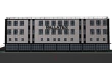Building facade of Pallatex building with four stories and many windows, black and gray design
