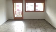 empty room, white tiles, wooden door, windows, balcony