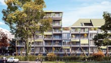 multi-story building, green roof, balconies, glass windows, green walls, plants
