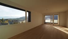 large windows, balcony, wooden floor, sliding glass doors