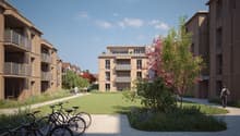 modern apartment buildings, balconies, landscaped area, bicycles, well-maintained garden