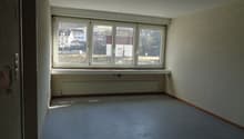 Empty room with windows and heating