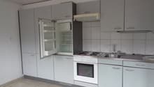 modern kitchen with refrigerator, sink, oven, stove, and dishwasher