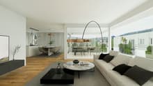 Spacious open-plan living area with large windows, hardwood floors, modern furniture including a sofa, coffee table, and dining table with chairs. The room has a balcony or terrace overlooking the city.
