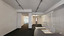 modern open hallway, white walls, black floor, multiple spotlights, white shelf