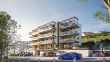 4 story apartment building with balconies