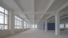 empty room, large windows, beams, exposed ceiling