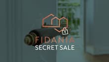 Logo for Fidania Secret Sale, features a door handle and keyhole