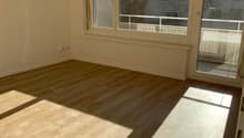 Wohnzimmer mit Balkon