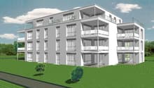 multistory building, white, many balconies, large windows, set in a green field