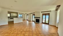 tiled floor, fireplace, sliding doors, windows, kitchen, hallway