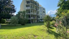 multistory building, balconies, garden, trees, grass, blue sky