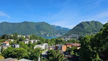Residential area, mountains, lake, blue sky