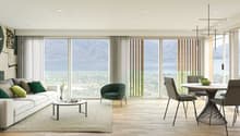 large sofa, large windows, coffee table, table with chairs, carpet, city view