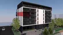 5-story modern apartment building with a mix of black, white, and red exterior colors, balconies on each floor, and landscaping around the building.