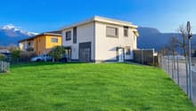 Detached house, white exterior, 2 floors, car parked in front, fenced yard, mountain view