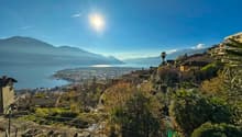 hillside view, houses, mountains, lake, clear sky, sun