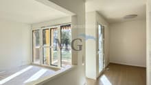 large glass doors, wooden floor, white walls, balcony, window