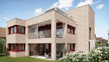 3 story house, brick wall, red windows, balconies, garden, patio