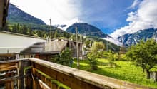 Blick auf die Alpen vom Balkon aus