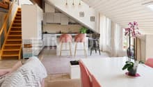 Espace dînatoire ouvert sur la cuisine