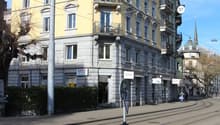 yellow building, multiple balconies, street, tram tracks