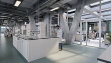 Open space with countertops, sinks, and glass partitions; modern fixtures and equipment.