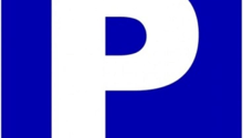 Blue sign with a white letter P indicating parking space