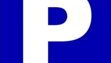 Parking area sign, blue and white color scheme