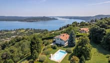 2 story house, surrounded by garden, with swimming pool, view over lake and mountains