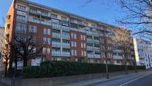 Residential apartment building with multiple floors and balconies