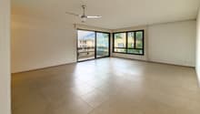 empty room, glass sliding doors, balcony, beige tile floor, ceiling fan, power outlets