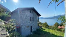 2 story stone house with lake view, balcony, small garden