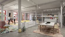 Modern and industrial designed interior with large open space, tables, chairs, couches, carpets, lamps, shelves, and people