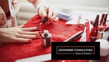Nail polish, nail polish remover, nail file, nail clipper, nail polish bottles, red towel