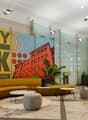 large reception, modern design, modern furniture, modern decor, art murals