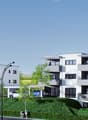 multi-story residential building with white facade, multiple balconies, underground parking