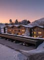 Modern building with wooden facade, large windows, covered parking, snow covered landscape