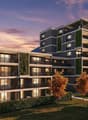Multistory building, vertical garden, balconies on each floor, landscaped area