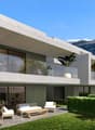 Modern 2 story house, gray concrete, glass windows, several balconies, terrace, yard, mountains in the background