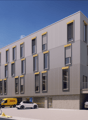 Large office building, grey and yellow exterior, multiple windows, underground parking