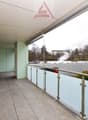 balcony with glass railing, view of mountains, tiled floor, walls, ceiling