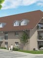 Multi-storey house, brown roof, large windows, balconies, garage, car parked, trees, lawn, seating area