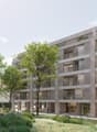 Modern residential apartment complex, concrete walls, large windows, multiple balconies, greenery, ground floor entrance