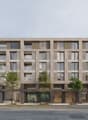 Multi-story residential building, large windows, balconies, modern design, elevated ground floor, concrete exterior
