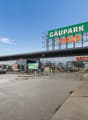 COOP supermarket, modern building, parking lot, advertising signs