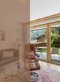 Wohnzimmer mit Zugang zur Terrasse