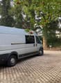 white van parked on a paved parking lot